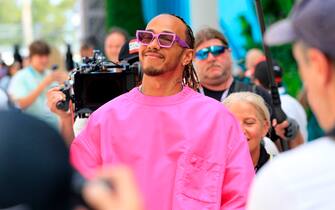 MIAMI GARDENS, FL - MAY 08: Mercedes-AMG Petronas driver Lewis Hamilton (44) of Great Britain comes into the paddock before the first running of the Crypto.com Miami Grand Prix on May 8, 2022 at the Miami International Autodrome in Miami Gardens, Florida.  (Photo by David J. Griffin/Icon Sportswire via Getty Images)