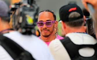 MIAMI GARDENS, FL - MAY 08: Mercedes-AMG Petronas driver Lewis Hamilton (44) of Great Britain comes into the paddock before the first running of the Crypto.com Miami Grand Prix on May 8, 2022 at the Miami International Autodrome in Miami Gardens, Florida.  (Photo by David J. Griffin/Icon Sportswire via Getty Images)