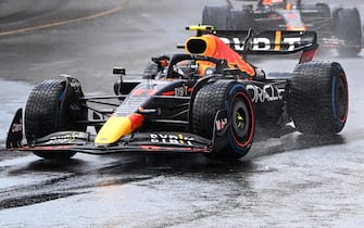 CIRCUIT DE MONACO, MONACO - MAY 29: Sergio Perez, Red Bull Racing RB18, leads Max Verstappen, Red Bull Racing RB18, and Lando Norris, McLaren MCL36 during the Monaco GP at Circuit de Monaco on Sunday May 29, 2022 in Monte Carlo, Monaco. (Photo by Mark Sutton / Sutton Images)