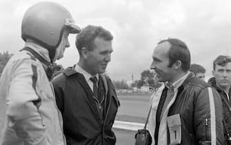 WATKINS GLEN INTERNATIONAL, UNITED STATES OF AMERICA - OCTOBER 06: Piers Courage, Alec Maskell of Dunlop, and Frank Williams during the United States GP at Watkins Glen International on October 06, 1968 in Watkins Glen International, United States of America. (Photo by David Phipps / Sutton Images)