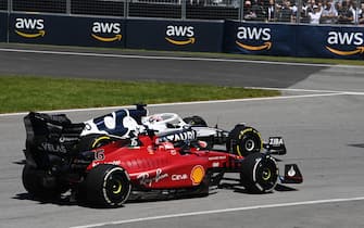 CIRCUIT GILLES-VILLENEUVE, CANADA - JUNE 19: Pierre Gasly, AlphaTauri AT03, battles with Charles Leclerc, Ferrari F1-75 during the Canadian GP at Circuit Gilles-Villeneuve on Sunday June 19, 2022 in Montreal, Canada. (Photo by Mark Sutton / Sutton Images)