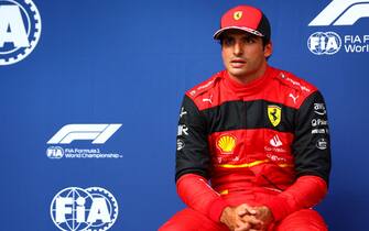 BUDAPEST, HUNGARY - JULY 30: Second placed qualifier Carlos Sainz of Spain and Ferrari looks dejected in parc ferme during qualifying ahead of the F1 Grand Prix of Hungary at Hungaroring on July 30, 2022 in Budapest, Hungary. (Photo by Dan Istitene - Formula 1/Formula 1 via Getty Images)