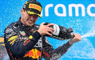 epa10100168 Red Bull Racing driver Max Verstappen of the Netherlands sprays sparkling wine on the podium after winning the Formula One Grand Prix of Hungary at the Hungaroring circuit in Mogyorod, near Budapest, Hungary, 31 July 2022.  EPA/Zsolt Czegledi HUNGARY OUT