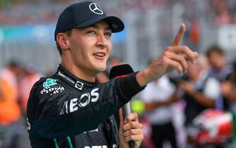 epa10098716 British Formula One driver George Russell of Mercedes-AMG Petronas reacts after setting a pole position during the qualifying session of the Formula One Grand Prix of Hungary at the Hungaroring circuit in Mogyorod, near Budapest, Hungary, 30 July 2022. The Formula One Grand Prix of Hungary will take place on 31 July 2022.  EPA/Zsolt Czegledi HUNGARY OUT