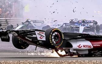 epa10049688 Chinese Formula One driver Guanyu Zhou of Alfa Romeo Racing crashes during the Formula One Grand Prix of Britain at the Silverstone Circuit, Silverstone, Britain, 03 July 2022.  EPA/CHRISTIAN BRUNA