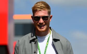 SPA, BELGIUM - AUGUST 28: Kevin de Bruyne walks in the Paddock ahead of  the F1 Grand Prix of Belgium at Circuit de Spa-Francorchamps on August 28, 2022 in Spa, Belgium. (Photo by Dan Mullan/Getty Images)