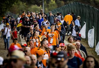 SPA - Fans of Max Verstappen walk the track in the run-up to the F1 Grand Prix of Belgium at the Spa-Francorchamps circuit on August 29, 2022 in Spa, Belgium. REMKO DE WAAL (Photo by ANP via Getty Images)