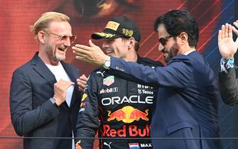 CIRCUIT ZANDVOORT, NETHERLANDS - SEPTEMBER 04: Charles Leclerc, Ferrari, 3rd position, Max Verstappen, Red Bull Racing, 1st position, and Mohammed bin Sulayem, President, FIA, on the podium during the Dutch GP at Circuit Zandvoort on Sunday September 04, 2022 in North Holland, Netherlands. (Photo by Mark Sutton / Sutton Images)