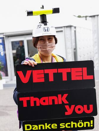 SUZUKA, JAPAN - OCTOBER 06: A fan of Sebastian Vettel, Aston Martin during the Japanese GP at Suzuka on Thursday October 06, 2022 in Suzuka, Japan. (Photo by Steven Tee / LAT Images)