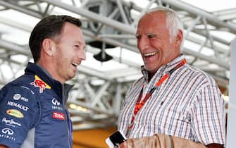 epa04808885 Red Bull CEO Dietrich Mateschitz (R) talks with Red Bull Racing Team Principal Christian Horner (L) after the second training session for the Formula One Grand Prix of Austria in Spielberg, Austria, 19 June 2015. The 2015 Formula One Grand Prix of Austria will take place on 21 June 2015.  EPA/ERWIN SCHERIAU