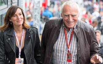 epa05405228 CEO and Founder of Red Bull Dietrich Mateschitz (R) with his girlfriend Marion Feichtner (L), before the race of the Formula One Grand Prix of Austria in Spielberg, Austria, 03 July 2016.  EPA/EXPA / JOHANN GRODER