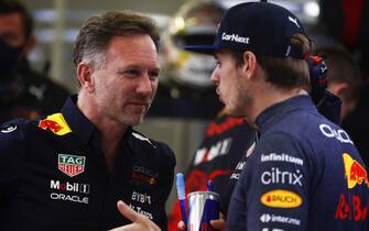 BAHRAIN INTERNATIONAL CIRCUIT, BAHRAIN - MARCH 20: Christian Horner, Team Principal, Red Bull Racing, and Max Verstappen, Red Bull Racing, on the grid during the Bahrain GP at Bahrain International Circuit on Sunday March 20, 2022 in Sakhir, Bahrain. (Photo by Carl Bingham / LAT Images)