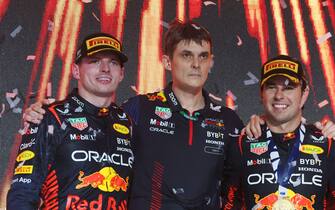 3/19/2023 - Max Verstappen, Red Bull Racing, 2nd position, the Red Bull trophy delegate, Sergio Perez, Red Bull Racing, 1st position, and Fernando Alonso, Aston Martin F1 Team, provisionally 3rd position, on the podium during the Formula 1 Saudi Arabia Grand Prix in Jeddah, Saudi Arabia. (Photo by Glenn Dunbar/Motorsport Images/Sipa USA) France OUT, UK OUT