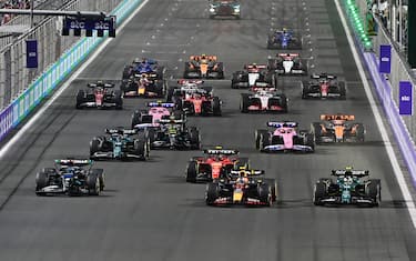 3/19/2023 - Sergio Perez, Red Bull Racing RB19, leads Fernando Alonso, Aston Martin AMR23, George Russell, Mercedes F1 W14, Carlos Sainz, Ferrari SF-23, Lance Stroll, Aston Martin AMR23, and the rest of the field at the start during the Formula 1 Saudi Arabia Grand Prix in Jeddah, Saudi Arabia. (Photo by Mark Sutton/Motorsport Images/Sipa USA) France OUT, UK OUT