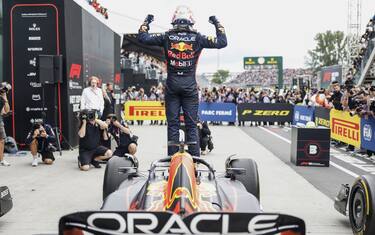 CIRCUIT GILLES-VILLENEUVE, CANADA - JUNE 18: Max Verstappen, Red Bull Racing, 1st position, celebrates on arrival in Parc Ferme during the Canadian GP at Circuit Gilles-Villeneuve on Sunday June 18, 2023 in Montreal, Canada. (Photo by Glenn Dunbar / LAT Images)