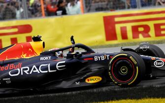 CIRCUIT GILLES-VILLENEUVE, CANADA - JUNE 18: Max Verstappen, Red Bull Racing RB19, 1st position, waves to fans on his way to Parc Ferme during the Canadian GP at Circuit Gilles-Villeneuve on Sunday June 18, 2023 in Montreal, Canada. (Photo by Andy Hone / LAT Images)
