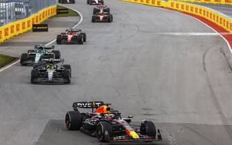 CIRCUIT GILLES-VILLENEUVE, CANADA - JUNE 18: Max Verstappen, Red Bull Racing RB19, leads Sir Lewis Hamilton, Mercedes F1 W14, Fernando Alonso, Aston Martin AMR23, and Charles Leclerc, Ferrari SF-23 during the Canadian GP at Circuit Gilles-Villeneuve on Sunday June 18, 2023 in Montreal, Canada. (Photo by Andy Hone / LAT Images)