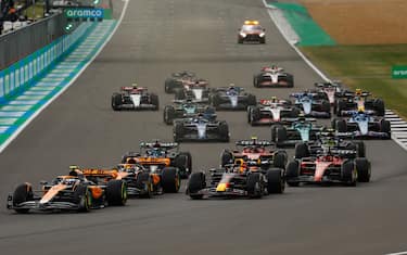 7/9/2023 - Lando Norris, McLaren MCL60, leads Max Verstappen, Red Bull Racing RB19, Oscar Piastri, McLaren MCL60, Charles Leclerc, Ferrari SF-23, Carlos Sainz, Ferrari SF-23, and the rest of the field at the start during the Formula 1 British Grand Prix in Silverstone, Great Britain. (Photo by Glenn Dunbar/Motorsport Images/Sipa USA) France OUT, UK OUT