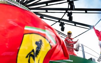 AUTODROMO NAZIONALE MONZA, ITALY - SEPTEMBER 08: Race winner Charles Leclerc, Ferrari celebrates on the podium with the champagne during the Italian GP at Autodromo Nazionale Monza on September 08, 2019 in Autodromo Nazionale Monza, Italy. (Photo by Simon Galloway / Sutton Images)