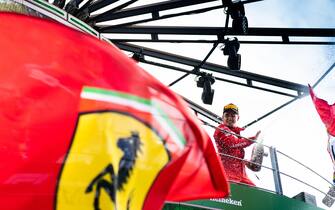 AUTODROMO NAZIONALE MONZA, ITALY - SEPTEMBER 08: Race winner Charles Leclerc, Ferrari celebrates on the podium with the champagne during the Italian GP at Autodromo Nazionale Monza on September 08, 2019 in Autodromo Nazionale Monza, Italy. (Photo by Simon Galloway / Sutton Images)