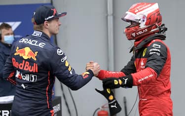 AUTODROMO INTERNAZIONALE ENZO E DINO FERRARI, ITALY - APRIL 22: Pole man Max Verstappen, Red Bull Racing, and Charles Leclerc, Ferrari, in Parc Ferme after Qualifying during the Emilia Romagna GP at Autodromo Internazionale Enzo e Dino Ferrari on Friday April 22, 2022 in imola, Italy. (Photo by Mark Sutton / Sutton Images)