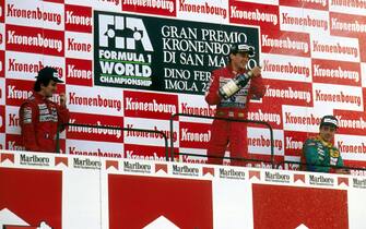 Imola, Italy.
21-23 April 1989.
Ayrton Senna (McLaren Honda) 1st position, Alain Prost (McLaren Honda) 2nd position and Alessandro Nannini (Benetton B188 Ford) 3rd position celebrate on the podium.
Ref-89 SM 03.
World Copyright - LAT Photographic