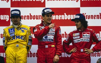 AUTODROMO INTERNAZIONALE ENZO E DINO FERRARI, ITALY - MAY 01: Nelson Piquet, 2nd position, Ayrton Senna, 1st position, and Alain Prost, 3rd position, on the podium during the San Marino GP at Autodromo Internazionale Enzo e Dino Ferrari on Sunday May 01, 1988 in imola, Italy. (Photo by Ercole Colombo / Studio Colombo)