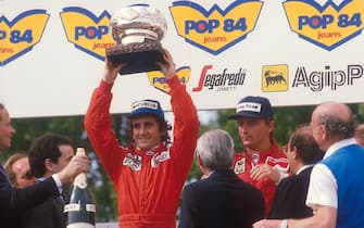 1984 San Marino Grand Prix.
Imola, Italy.
4-6 May 1984.
Alain Prost (McLaren TAG Porsche) 1st position and Rene Arnoux (Ferrari) 2nd position on the podium.
World Copyright - LAT Photographic