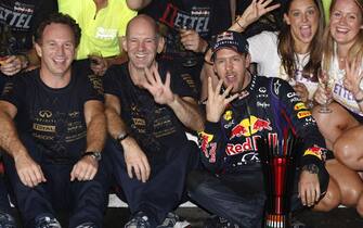 Buddh International Circuit, New Delhi, India.
Sunday 27th October 2013.
Sebastian Vettel, Red Bull Racing, 1st position, Adrian Newey, Chief Technical Officer, Red Bull Racing, Christian Horner, Team Principal, Red Bull Racing, and the Red Bull team celebrate after securing the world drivers and constructors titles.
World Copyright: Charles Coates/LAT Photographic.
ref: Digital Image _N7T5889