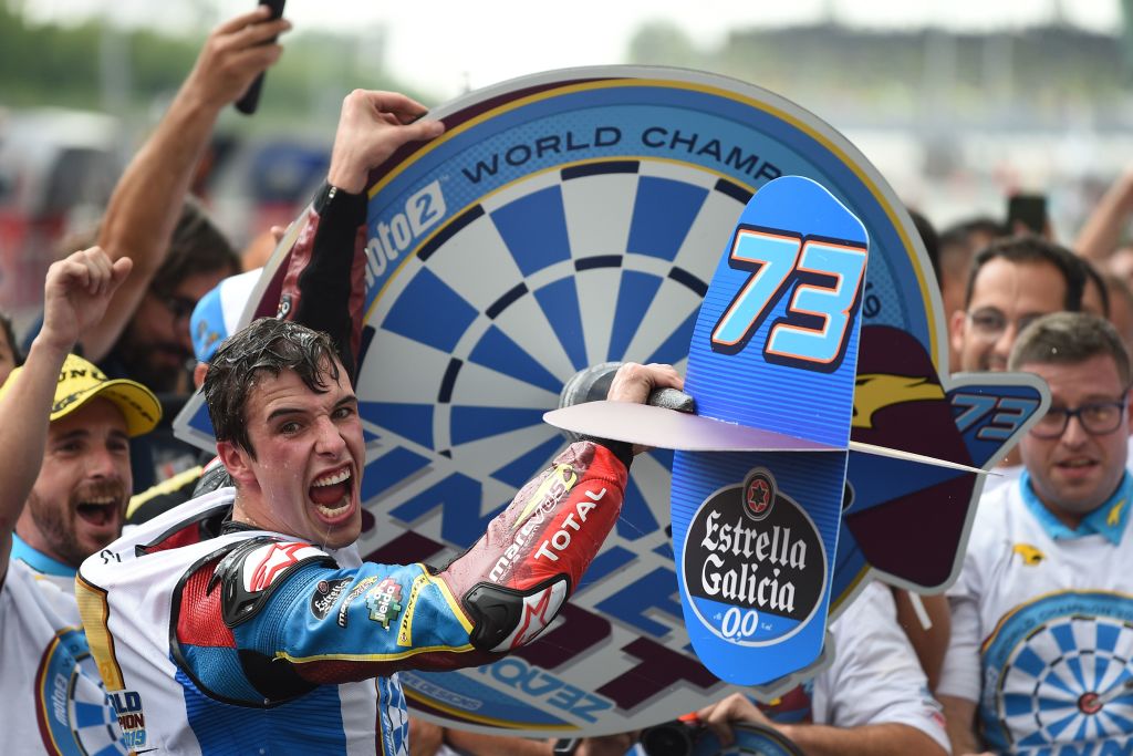 1179698919 EG 0,0 Marc VDS's Spanish rider Alex Marquez (C) celebrates becoming Moto2 world champion following the Moto2-class Malaysian Grand Prix motorcycle race at the Sepang International Circuit in Sepang on November 3, 2019. (Photo by Mohd RASFAN / AFP) (Photo by MOHD RASFAN/AFP via Getty Images)