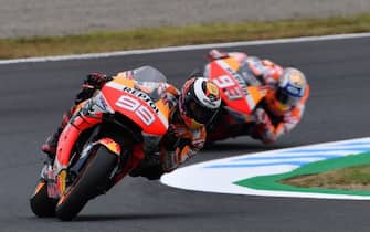 Repsol Honda Team rider Jorge Lorenzo of Spain (L) leads teammate Marc Marquez of Spain (R) during the second free practice session at the Twin Ring Motegi circuit in Motegi, Tochigi prefecture on October 18, 2019. (Photo by TOSHIFUMI KITAMURA / AFP) (Photo by TOSHIFUMI KITAMURA/AFP via Getty Images)