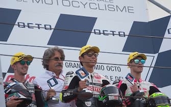 MISANO ADRIATICO, ITALY - SEPTEMBER 15: (L-R) John McPhee of Great Britain and Petronas Sprinta Racing, Paolo Simoncelli of Italy, Tatsuki Suzuki of Japan and Sic 58 Squadra Corse and Tony Arbolino of Italy and Snipers Team celebrate on the podium at the end of the Moto3 race during the MotoGp of San Marino - Race at Misano World Circuit on September 15, 2019 in Misano Adriatico, Italy. (Photo by Mirco Lazzari gp/Getty Images)