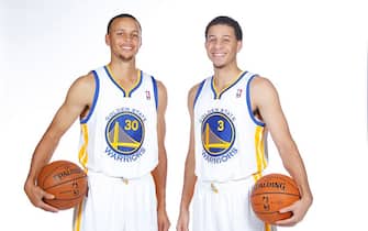 OAKLAND, CA - SEPTEMBER 27:  Stephen Curry #30 and Seth Curry #3 pose for a photo on Golden State Warriors media day held September 27, 2013 at the Warriors practice facility in Oakland, California. NOTE TO USER: User expressly acknowledges and agrees that, by downloading and/or using this Photograph, user is consenting to the terms and conditions of the Getty Images License Agreement. Mandatory Copyright Notice: Copyright 2013 NBAE (Photo by Rocky Widner/NBAE via Getty Images)