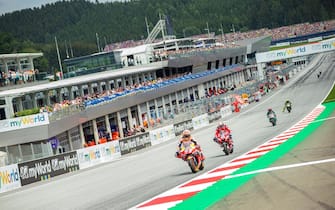 epa07768452 f.l.: Spanish MotoGP rider Marc Marquez of Repsol Honda Team Italian MotoGP rider Andrea Dovizioso of Ducati Team during th race for the MotoGP of Austria at the Red Bull Ring in Spielberg, Austria, on August 11, 2019.  EPA/DOMINIK ANGERER