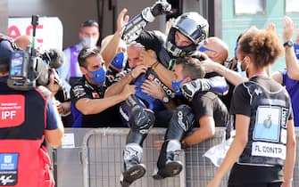 Spanish MotoGp rider Maverick Viñales of Monster Energy Yamaha MotoGP Moto celebrates with team'members after winning the motorcycling Grand Prix of San Marino at the Misano World Circuit Marco Simoncelli, Italy, 19 September 2020. ANSA/PASQUALE BOVE