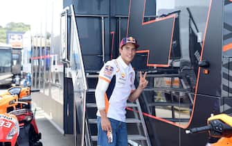 Repsol Honda Team's Spanish rider Marc Marquez makes the victory sign on the sidelines of the Andalucia Grand Prix at the Jerez race track in Jerez de la Frontera on July 26, 2020. - Marquez will not start the Andalucia MotoGP in Jerez after dropping out of qualifying four days after an operation on a broken arm. (Photo by JAVIER SORIANO / AFP) (Photo by JAVIER SORIANO/AFP via Getty Images)