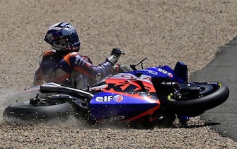 Red Bull KTM Tech 3's Portuguese rider Miguel Oliveira crashes during the MotoGP race during the Andalucia Grand Prix at the Jerez race track in Jerez de la Frontera on July 26, 2020. (Photo by JAVIER SORIANO / AFP) (Photo by JAVIER SORIANO/AFP via Getty Images)