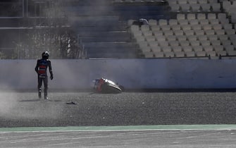 VALENCIA, SPAIN - NOVEMBER 19:  Iker Lecuona of Spanish and Team KTM Tech 3 walks out of track after crashed out during the pre-season MotoGP Tests in Valencia at Ricardo Tormo Circuit on November 19, 2019 in Valencia, Spain. (Photo by Mirco Lazzari gp/Getty Images)