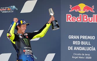 epa08566895 Italian MotoGP rider Valentino Rossi (Monster Energy Yamaha MotoGP) celebrates on the podium after getting the third position in the race in Jerez-Angel Nieto circuit in Jerez de la Frontera, Spain, 26 July 2020, during the Motorcycling Grand Prix of Andalusia.  EPA/ROMAN RIOS