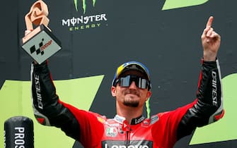 SPAIN MOTORCYCLING GRAND PRIX epa09250970 Australian MotoGP rider Jack Miller of the Ducati Lenovo team celebrates on the podium after taking the third place in the Motorcycling Grand Prix of Catalonia at the Barcelona-Catalunya circuit in Montmelo, near Barcelona, Spain, 06 June 2021. EPA/Alejandro Garcia