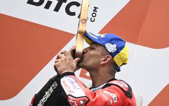 AUSTRIA MOTORCYCLING GRAND PRIX epa09415203 Third placed Spanish MotoGP rider Jorge Martin of Pramac Racing celebrates on the podium for the Motorcycling Grand Prix of Austria at the Red Bull Ring in Spielberg, Austria, 15 August 2021. EPA/CHRISTIAN BRUNA