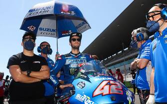 PORTUGAL MOTORCYCLING GRAND PRIX epa09143376 Spanish rider of Suzuki Ecstar team, Alex Rins, on the grid prior to the MotoGP Motorcycling Grand Prix of Portugal at Algarve International race track in Portimao, southern Portugal, 18 April 2021. EPA/JOSE SENA GOULAO
