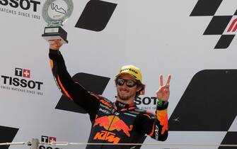 SPAIN MOTORCYCLING GRAND PRIX epa09463340 Australian Moto2 rider Remy Gardner of Red Bull KTM Ajo celebrates celebrates on the podium his second place in the Motorcycling Grand Prix of Aragon at MotorLand Aragon circuit in Alcaniz, Teruel, northern Spain, 12 September 2021. EPA/JAVIER CEBOLLADA