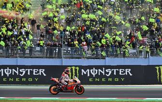 Race winner Honda Spanish rider Marc Marquez rides his motorbike past fans on October 24, 2021 after the Emilia-Romagna MotoGP Grand Prix at the Misano World Circuit Marco-Simoncelli in Misano Adriatico, Italy. (Photo by ANDREAS SOLARO / AFP) (Photo by ANDREAS SOLARO/AFP via Getty Images)