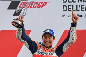 Race winner Honda Spanish rider Marc Marquez celebrates on the podium on October 24, 2021 after the Emilia-Romagna MotoGP Grand Prix at the Misano World Circuit Marco-Simoncelli in Misano Adriatico, Italy. (Photo by ANDREAS SOLARO / AFP) (Photo by ANDREAS SOLARO/AFP via Getty Images)