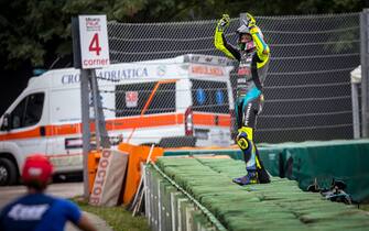 MISANO ADRIATICO, ITALY - SEPTEMBER 19: Valentino Rossi of Italy and Petronas Yamaha SRT stays on the tires and greets his fans during the race of the MotoGP Gran Premio Octo di San Marino e della Riviera di Rimini at Misano World Circuit on September 19, 2021 in Misano Adriatico, Italy. (Photo by Steve Wobser/Getty Images)