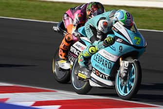 MISANO ADRIATICO, ITALY - OCTOBER 24: Denis Foggia of Italy and Leopard Racing leads Andrea Migno of Italy and Rivacold Snipers Team during the Moto3 race during the MotoGP of Emilia Romagna - Race at Misano World Circuit on October 24, 2021 in Misano Adriatico, Italy. (Photo by Mirco Lazzari gp/Getty Images)