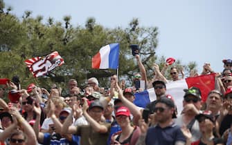 epa09948795 Spectators during the MotoGP race at the French Motorcycling Grand Prix in Le Mans, France, 15 May 2022.  EPA/YOAN VALAT