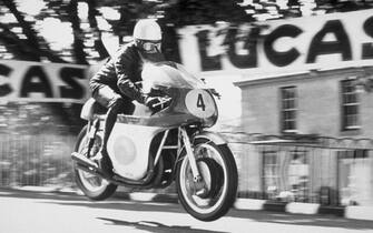 circa 1945:  Gary Hocking MBE on the Augusta Ballaugh Bridge, during the Senior Isle of Man TT Race.  (Photo by Topical Press Agency/Getty Images)