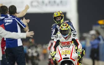 DOHA, QATAR - APRIL 07: Valentino Rossi of Italy and Yamaha Factory Racing celebrates at the end of the MotoGP race of the MotoGp of Qatar at Losail Circuit on April 7, 2013 in Doha, Qatar. (Photo by Mirco Lazzari gp/Getty Images)